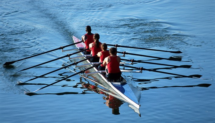 ca. 2001 --- Rowers Rowing Boat --- Image by © Royalty-Free/Corbis